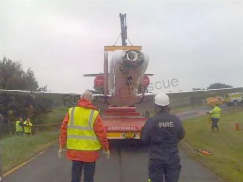 plane on trailer from back