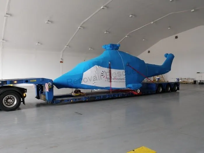 plane on trailer with cover